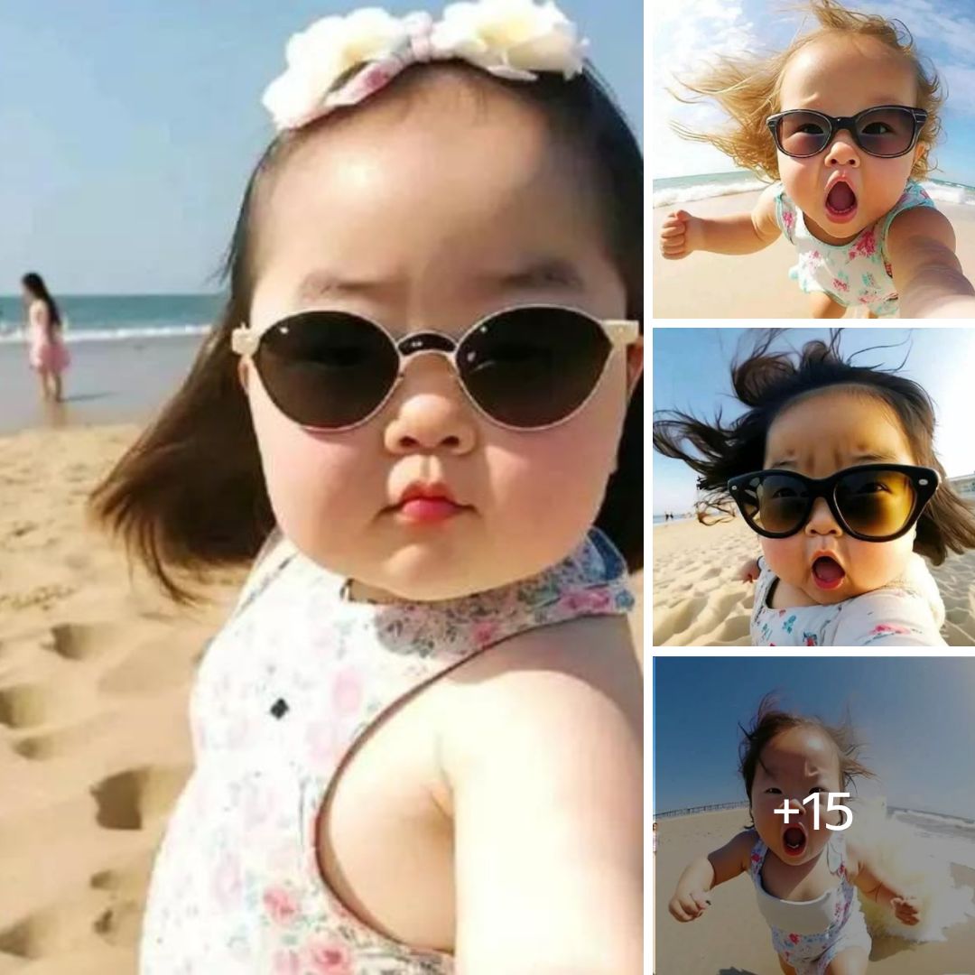 Adorable-Baby-Expression-on-the-Beach